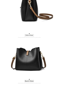 Detail view of black bucket bag with brown strap showing the side and back profiles