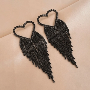 Elegant black rhinestone heart earrings with long fringe tassels on beige background
