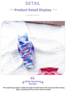 Detail of heart pattern acrylic hair claw clip showing large opening and strong grip