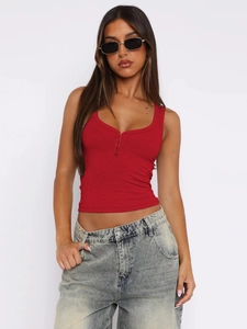 Detail shot of dark red rib-knit crop top with front five-button henley design