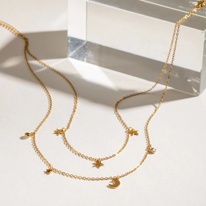 Double-layered gold stainless steel necklace with star, moon and zircon pendants