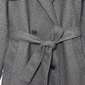 Retro charcoal grey wool blend coat featuring a classic waist belt and button details