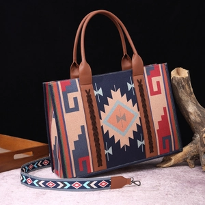 Bohemian printed cotton linen shoulder bag with brown leather handles and patterned strap