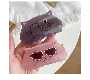 Detailed view of translucent purple and pink acrylic cat hair claws for girls