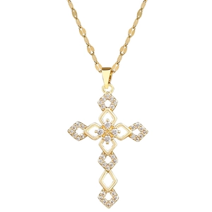 Titanium steel cross necklace with sparkling zircon crystals on a gold lip chain
