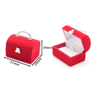 Detailed view of mini red suitcase jewelry box with dimensions and soft velvet interior