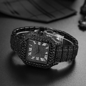 Macro shot of all-black iced-out square watch with Roman numerals and full crystal band