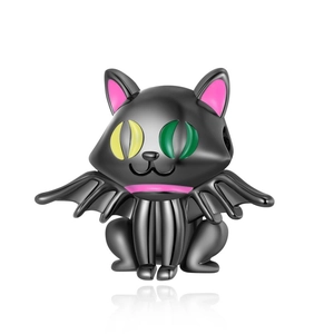 Detail of black cat bead charm with bat wings and colorful eyes for DIY jewelry making
