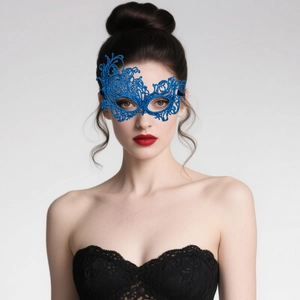 Detail of blue lace phoenix mask showing intricate patterns on a fashion model