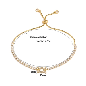 Adjustable gold tennis bracelet with cubic zirconia pendant and 26cm chain dimensions
