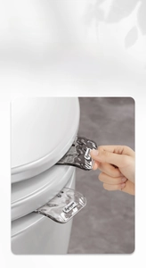 Detail of hygienic toilet lid lifter with luxury water ripple texture and dual color design