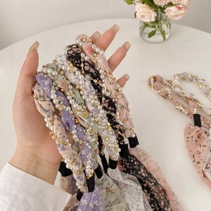 Floral fabric hairbands with pearl beads and ribbons in multiple soft colors and patterns