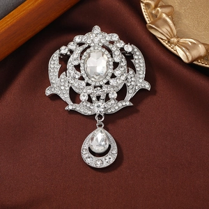 Vintage palace style silver brooch with crystal pavé and moving teardrop pendant