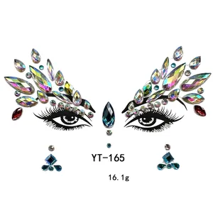 Macro detail of YT-165 iridescent AB acrylic face gems and eye rhinestones for party makeup