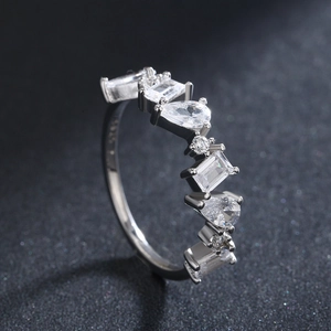 S925 sterling silver ring with irregular cubic zirconia stones in wavy design