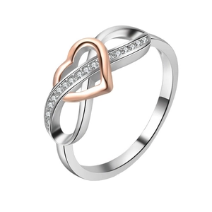 Infinity heart ring with rose gold plating and white zircon stones in polished silver