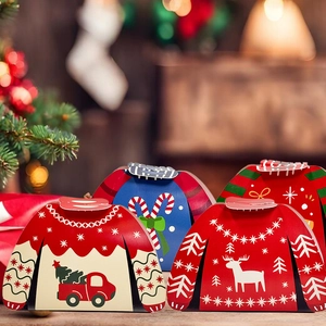 Detailed view of colorful sweater-shaped Christmas gift boxes with festive reindeer patterns