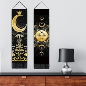 Bohemian black wall tapestry with golden sun moon floral patterns and fringe decor