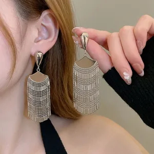 Elegant silver fan-shaped tassel drop earrings for women with a metallic mirror finish