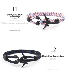 Detail of woven rope bracelets featuring unique black airplane-shaped metal buckle clasps