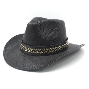 Vintage black straw cowboy hat with wide brim and gold studded decorative band for summer