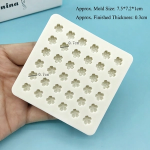 Macro view of silicone flower mold with 36 micro cherry blossom cavities and dimensions