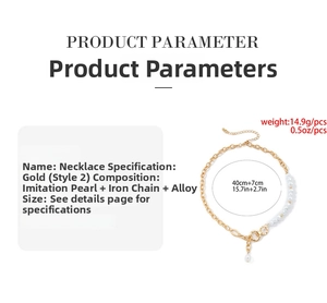 Detail of vintage faux pearl and gold chain necklace showing adjustable extension link