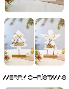 Detailed view of wood Christmas tree and angel tabletop ornaments with bells and bows