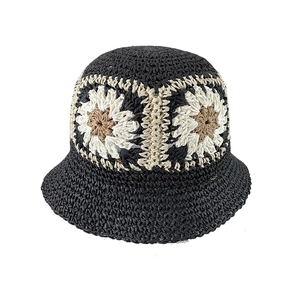 Handmade crochet folding straw hat with floral patterns for summer beach travel