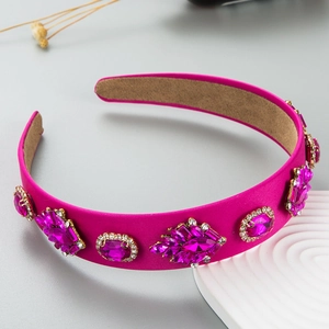 Detail of rose red velvet headband with purple rhinestones and clear crystal accents