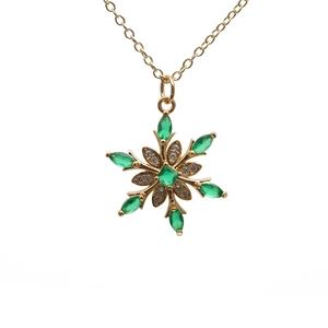 Gold-plated flower pendant necklace with marquise-cut green zircon and shimmering accents