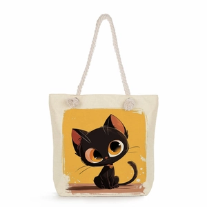 Close-up of artistic black cat print on beige canvas tote with thick white rope handles