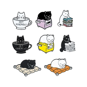 Set of 8 cute cartoon cat enamel pins featuring kittens reading and drinking coffee