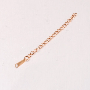 Detail of rose gold stainless steel extender chain with droplet tag for DIY jewelry