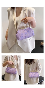 Detail of purple lace evening bag with 3D floral appliques and golden metal clasp