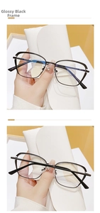Detailed view of glossy black cat-eye glasses frame with premium white leather case
