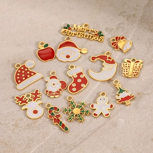 Mixed Christmas charms featuring Santa and reindeer on textured stone background