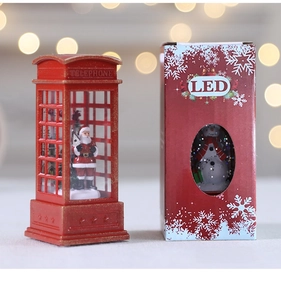 Christmas LED phone booth lantern detail with festive Santa scene and gift box