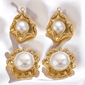 Detailed macro of golden sunflower pearl charms on elegant white silk background