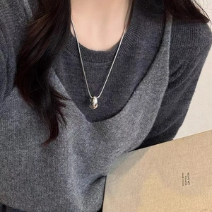 Minimalist silver teardrop pendant necklace with sleek snake chain for women