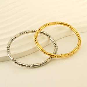 Minimalist stainless steel tubular bracelet set in gold and silver finish with beads