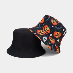 Reversible Halloween bucket hat with spooky pumpkin, skull, and bat prints in black cotton