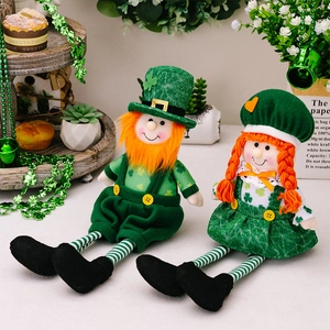 Detailed close-up of St. Patrick's Day plush leprechaun couple dolls with shamrock patterns