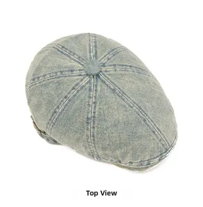 Top view of retro washed denim beret featuring neat stitching and fabric-covered button