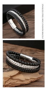 Macro view of woven leather and stainless steel beads with magnetic clasp on wood