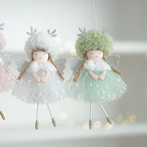 Adorable plush Christmas angel doll ornaments with wings and tulle skirts in soft colors