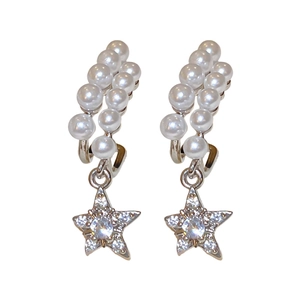 Star earrings with pearls and zircons in silver finish on a clean white background