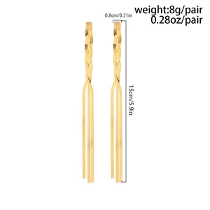 Detail view of long gold tassel earrings with flat snake chain and size dimensions