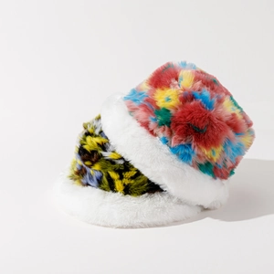 Detail of faux fur bucket hats showing colorful tie-dye and animal leopard print textures