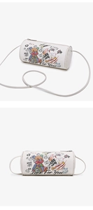 Detail of the cylindrical crossbody bag with cute bear graffiti print and pebble leather texture